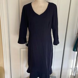 Navy Talbots sheath dress with subtle ruffle hem and sleeves